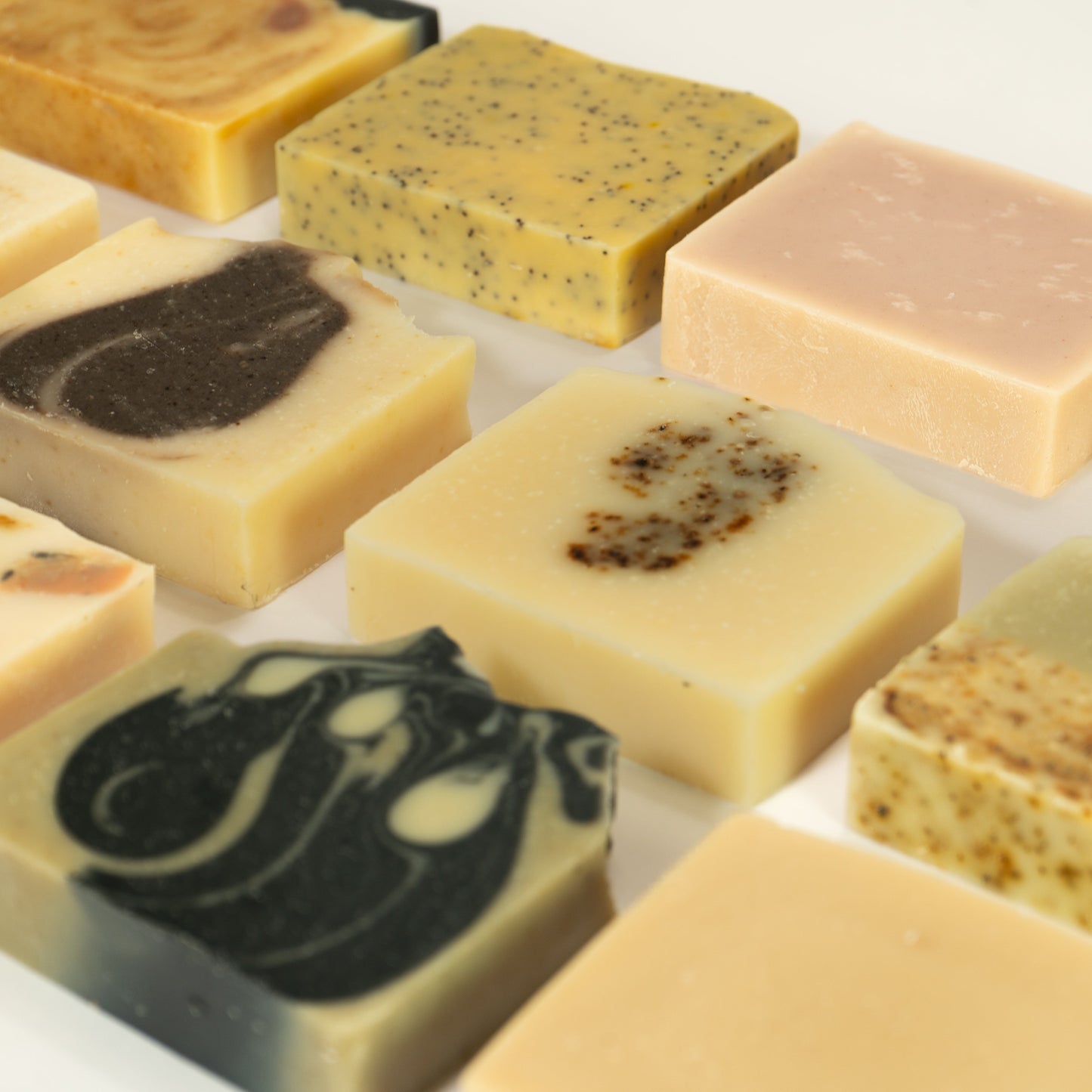 an array of colorful natural tallow soap bars
